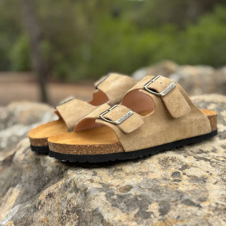 Woman wearing AGL suede sandals outdoors, comfortable design