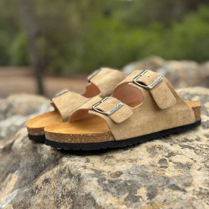 Woman wearing AGL suede sandals outdoors, comfortable design